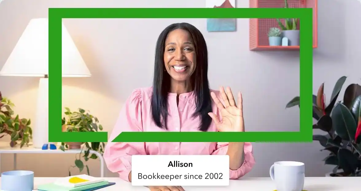 A business owner checks updates on his mobile phone